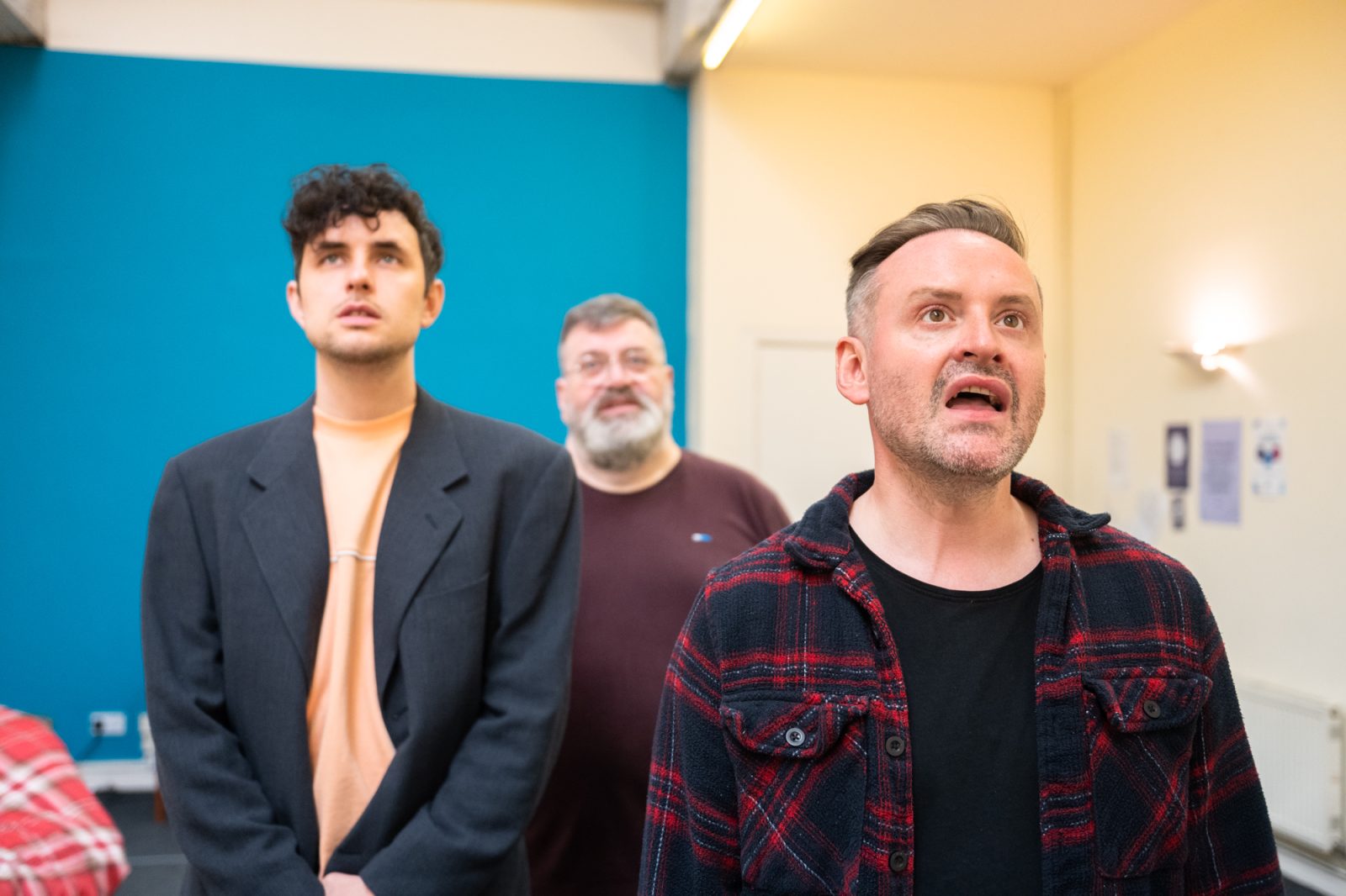 Dylan Wood, Tom Urie and Darren Brownlie singing in the rehearsal room.